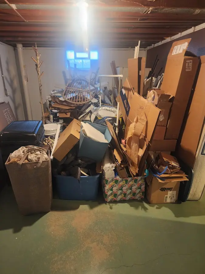 Roll-off dumpster container at job site for 4 Yard Dumpster Rental in Hazel Green